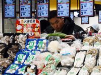 A consumer shops at a supermarket in Handan, China, on December 9, 2024. On December 16, 2024, the National Bureau of Statistics releases da...