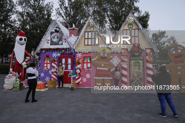 Dozens of people visit a Christmas village set up in the Tlahuac Forest in Mexico City, Mexico, on December 15, 2024. 