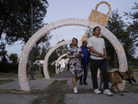 Dozens of people visit a Christmas village set up in the Tlahuac Forest in Mexico City, Mexico, on December 15, 2024. (