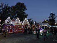 Dozens of people visit a Christmas village set up in the Tlahuac Forest in Mexico City, Mexico, on December 15, 2024. (