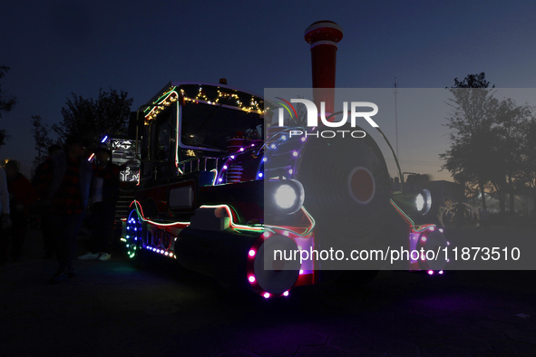 A view of a train in a Christmas village set up in the Tlahuac Forest in Mexico City, Mexico, on December 15, 2024. 