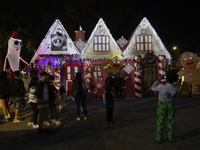 Dozens of people visit a Christmas village set up in the Tlahuac Forest in Mexico City, Mexico, on December 15, 2024. (