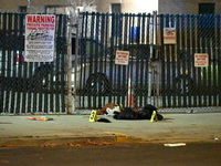 New York City Police Department crime scene investigators stage at the scene where a 26-year-old man identified as Tyreek Moore is shot and...