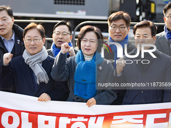 Chu Mi-ae, the head of the Democratic Party's Yoon Suk-yeol Rebellion Investigation Committee, along with about 20 lawmakers from the commit...