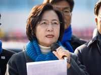 Chu Mi-ae (center), the head of the Democratic Party's Yoon Suk-yeol Rebellion Investigation Committee, and about 20 lawmakers from the comm...