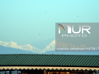 Mount Kangchenjunga is seen from Siliguri, India, on December 16, 2024. Kangchenjunga is the world's third highest mountain at 8,169 feet af...