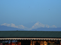 Mount Kangchenjunga is seen from Siliguri, India, on December 16, 2024. Kangchenjunga is the world's third highest mountain at 8,169 feet af...