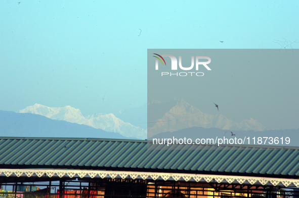 Mount Kangchenjunga is seen from Siliguri, India, on December 16, 2024. Kangchenjunga is the world's third highest mountain at 8,169 feet af...