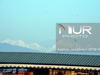 Mount Kangchenjunga is seen from Siliguri, India, on December 16, 2024. Kangchenjunga is the world's third highest mountain at 8,169 feet af...