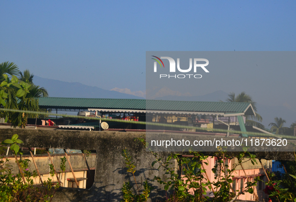 Mount Kangchenjunga is seen from Siliguri, India, on December 16, 2024. Kangchenjunga is the world's third highest mountain at 8,169 feet af...