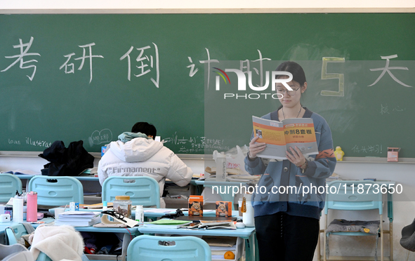 Students prepare for the 2025 national postgraduate entrance exam at Hebei University of Engineering in Handan, China, on December 16, 2024....