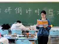 Students prepare for the 2025 national postgraduate entrance exam at Hebei University of Engineering in Handan, China, on December 16, 2024....