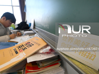 Students prepare for the 2025 national postgraduate entrance exam at Hebei University of Engineering in Handan, China, on December 16, 2024....