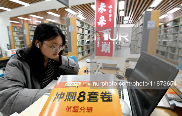 Students prepare for the 2025 national postgraduate entrance exam at Hebei University of Engineering in Handan, China, on December 16, 2024....