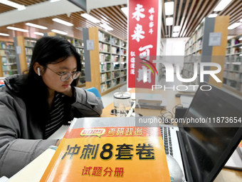 Students prepare for the 2025 national postgraduate entrance exam at Hebei University of Engineering in Handan, China, on December 16, 2024....