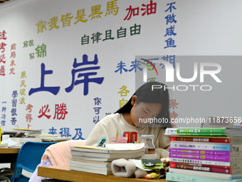 Students prepare for the 2025 national postgraduate entrance exam at Hebei University of Engineering in Handan, China, on December 16, 2024....