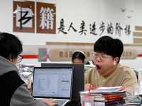 Students prepare for the 2025 national postgraduate entrance exam at Hebei University of Engineering in Handan, China, on December 16, 2024....