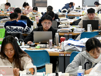 Students prepare for the 2025 national postgraduate entrance exam at Hebei University of Engineering in Handan, China, on December 16, 2024....