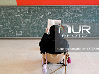 Students prepare for the 2025 national postgraduate entrance exam at Hebei University of Engineering in Handan, China, on December 16, 2024....