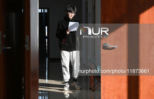 Students prepare for the 2025 national postgraduate entrance exam at Hebei University of Engineering in Handan, China, on December 16, 2024....