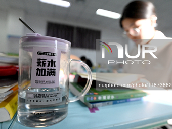 Students prepare for the 2025 national postgraduate entrance exam at Hebei University of Engineering in Handan, China, on December 16, 2024....