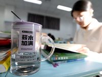 Students prepare for the 2025 national postgraduate entrance exam at Hebei University of Engineering in Handan, China, on December 16, 2024....