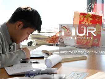 Students prepare for the 2025 national postgraduate entrance exam at Hebei University of Engineering in Handan, China, on December 16, 2024....