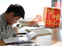 Students prepare for the 2025 national postgraduate entrance exam at Hebei University of Engineering in Handan, China, on December 16, 2024....