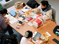 Students prepare for the 2025 national postgraduate entrance exam at Hebei University of Engineering in Handan, China, on December 16, 2024....