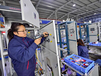 A worker works at a workshop of a water supply equipment manufacturing company in Qingzhou, China, on December 16, 2024. (