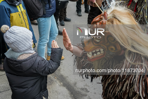 The Perchtenlauf is a centuries-old winter parade tradition held in Grafing, Bavaria, Germany, on December 15, 2024. Participants, adorned i...