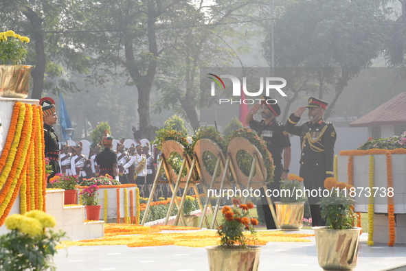 Bangladesh military officer Aminur Rahman and Indian army officer MS Dhillon place a wreath and pay tribute on the occasion of 'Vijay Diwas'...