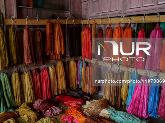 Threads left to dry are seen inside a dyeing center in Srinagar, Jammu and Kashmir, on December 16, 2024. Kashmiris dye fabric and threads m...