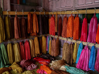 Threads left to dry are seen inside a dyeing center in Srinagar, Jammu and Kashmir, on December 16, 2024. Kashmiris dye fabric and threads m...