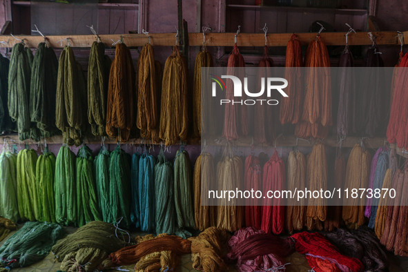 Threads left to dry are seen inside a dyeing center in Srinagar, Jammu and Kashmir, on December 16, 2024. Kashmiris dye fabric and threads m...