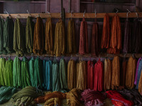 Threads left to dry are seen inside a dyeing center in Srinagar, Jammu and Kashmir, on December 16, 2024. Kashmiris dye fabric and threads m...