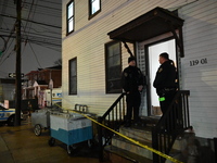 A 32-year-old woman dies and a 49-year-old man is wounded in a shooting in College Point, Queens, New York, United States, on December 16, 2...