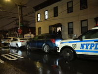 A 32-year-old woman dies and a 49-year-old man is wounded in a shooting in College Point, Queens, New York, United States, on December 16, 2...