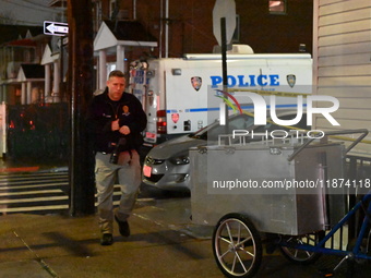 NYPD crime scene investigators investigate where a 32-year-old woman is found dead and a 49-year-old man is wounded in a shooting in College...