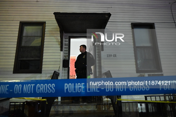 NYPD crime scene investigators investigate where a 32-year-old woman is found dead and a 49-year-old man is wounded in a shooting in College...