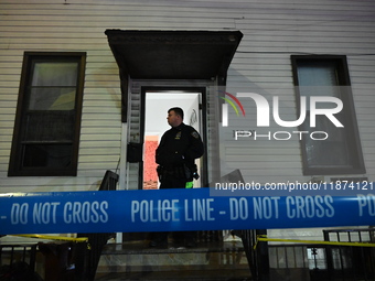 NYPD crime scene investigators investigate where a 32-year-old woman is found dead and a 49-year-old man is wounded in a shooting in College...