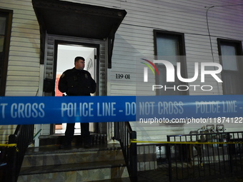 NYPD crime scene investigators investigate where a 32-year-old woman is found dead and a 49-year-old man is wounded in a shooting in College...