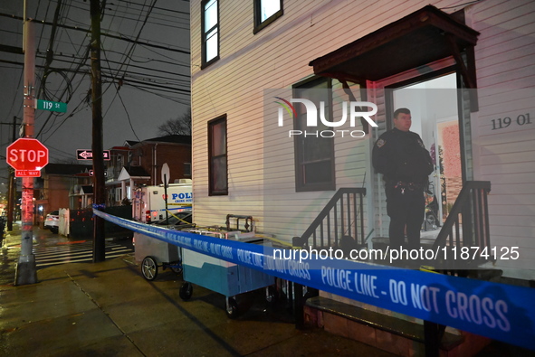 NYPD crime scene investigators investigate where a 32-year-old woman is found dead and a 49-year-old man is wounded in a shooting in College...