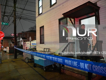 NYPD crime scene investigators investigate where a 32-year-old woman is found dead and a 49-year-old man is wounded in a shooting in College...