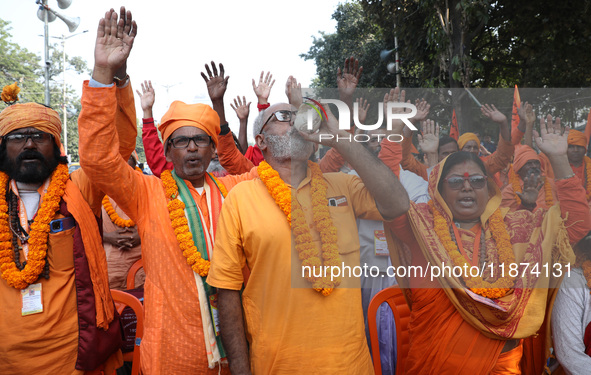 Members of Hindu Suraksha Samiti shout slogans during a protest against the recent arrest of ISKCON Bangladesh priest Chinmoy Krishna Das by...