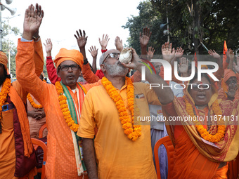 Members of Hindu Suraksha Samiti shout slogans during a protest against the recent arrest of ISKCON Bangladesh priest Chinmoy Krishna Das by...