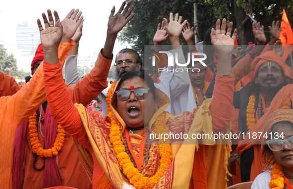 Members of Hindu Suraksha Samiti shout slogans during a protest against the recent arrest of ISKCON Bangladesh priest Chinmoy Krishna Das by...