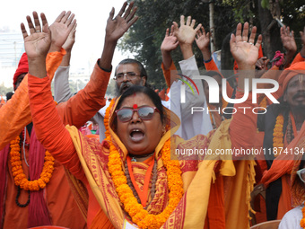 Members of Hindu Suraksha Samiti shout slogans during a protest against the recent arrest of ISKCON Bangladesh priest Chinmoy Krishna Das by...