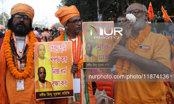 Members of Hindu Suraksha Samiti shout slogans during a protest against the recent arrest of ISKCON Bangladesh priest Chinmoy Krishna Das by...