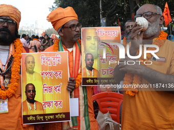 Members of Hindu Suraksha Samiti shout slogans during a protest against the recent arrest of ISKCON Bangladesh priest Chinmoy Krishna Das by...